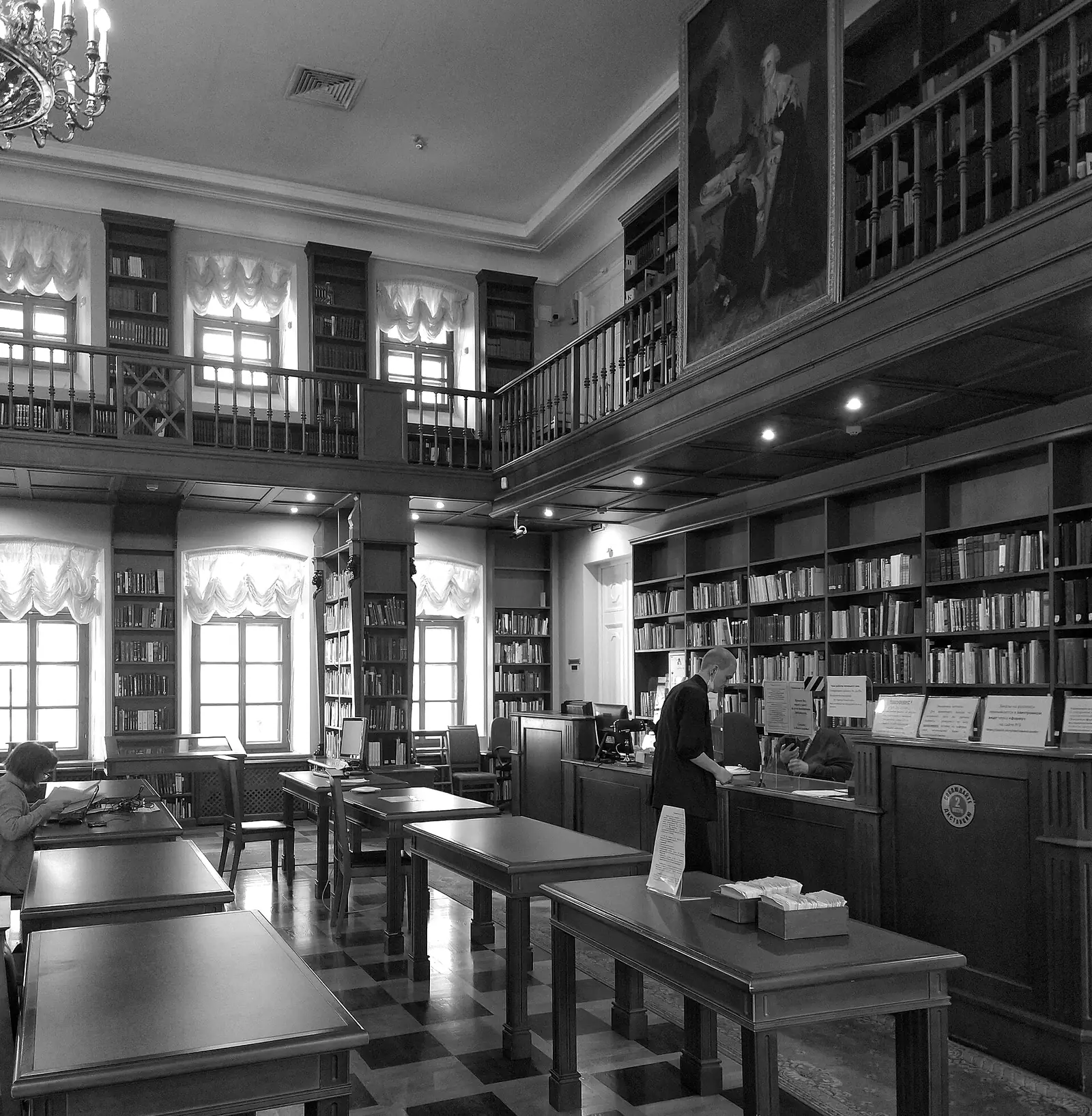 The Rumyantsev Hall in Pashkov House, Moscow: the manuscripts reading room, with a gallery of books above the desks.